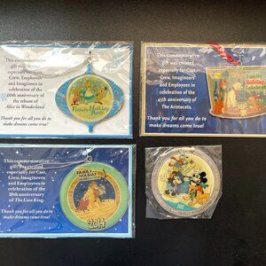 4 Disney Family Holiday Celebration Ornaments NEW